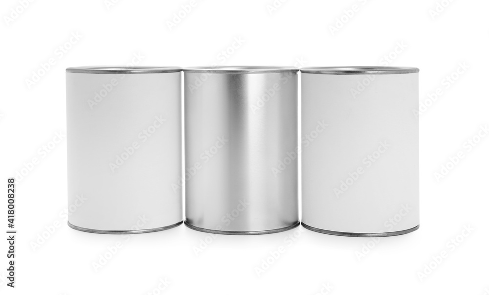 Cans of paint on white background