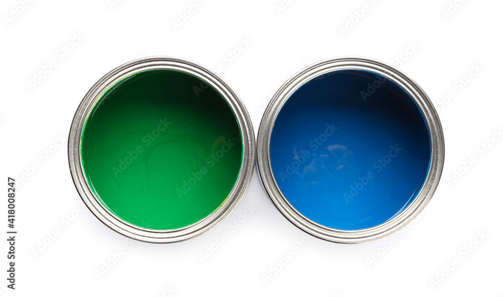 Cans of paints on white background