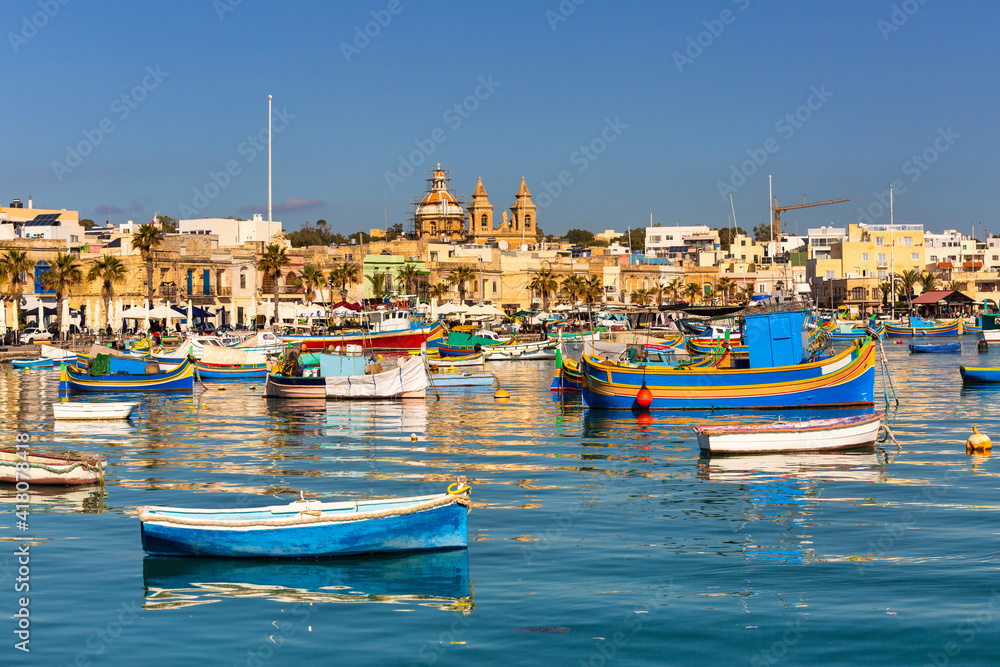 Traditional fishing boats in the Mediterranean Village of Marsaxlokk, Malta