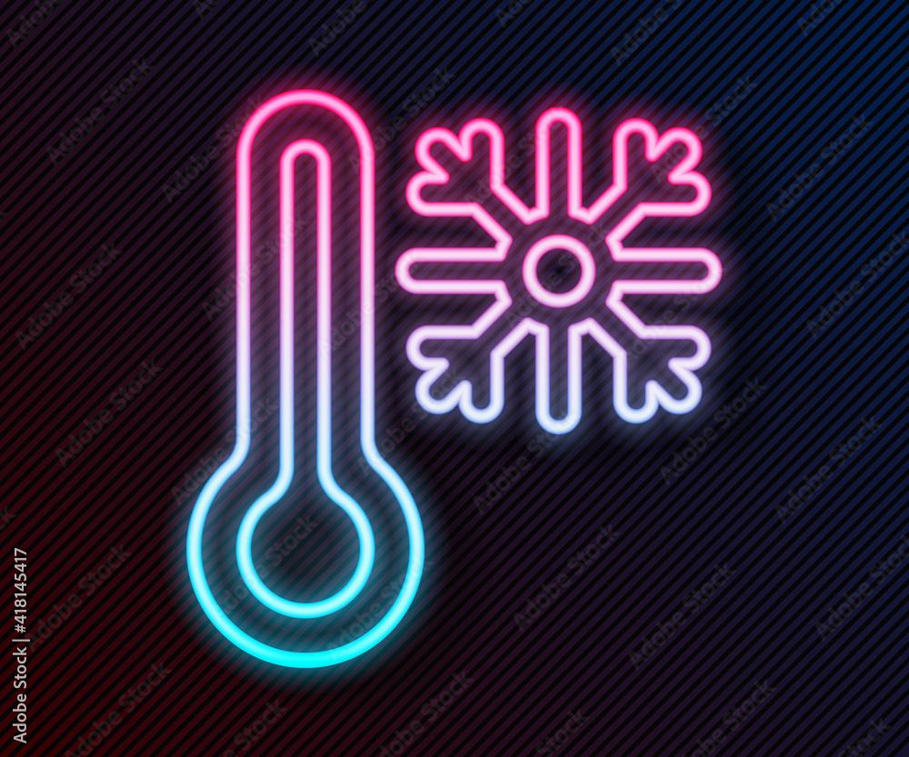 Glowing neon line Thermometer with snowflake icon isolated on black background. Vector.