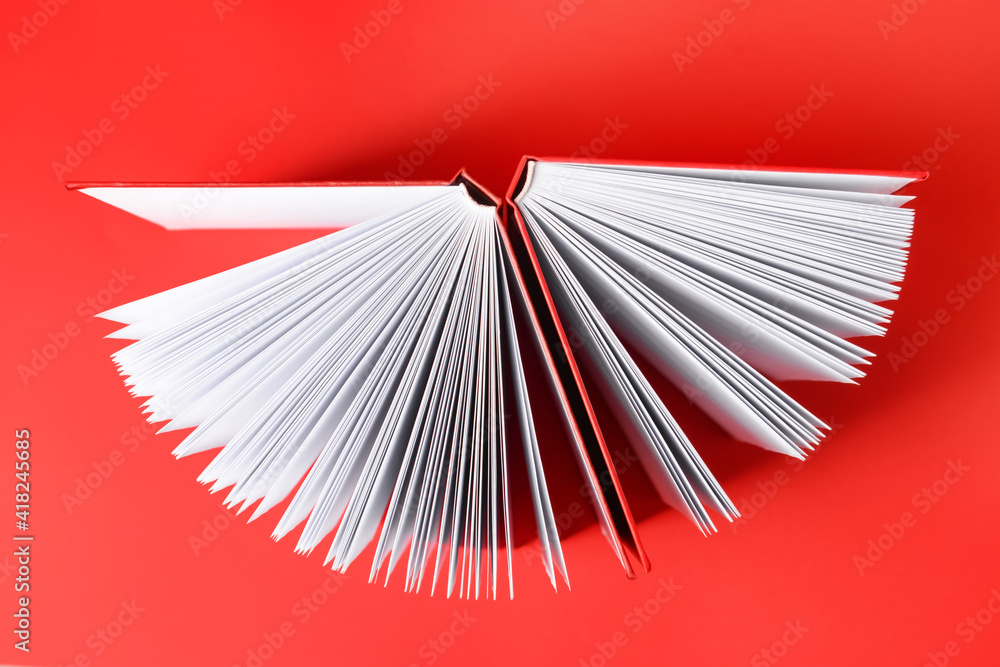 Blank books on color background