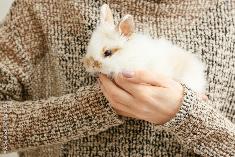 Woman with cute rabbit, closeup