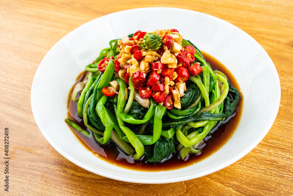 Seasonal wild vegetables in spring with dandelion