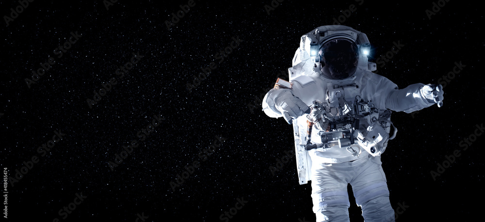 Astronaut spaceman do spacewalk while working for space station in outer space . Astronaut wear full