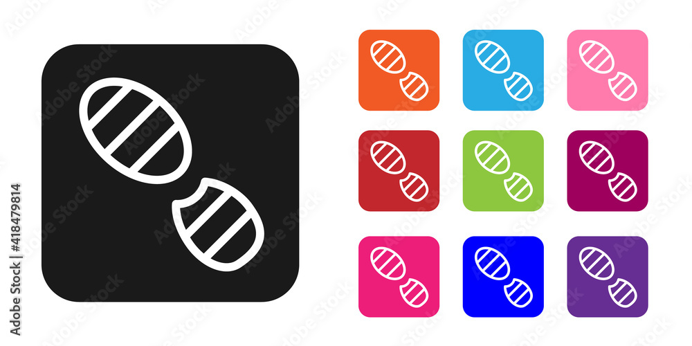 黑色人类脚印鞋图标孤立在白色背景上。鞋底。将图标设置为彩色。面纱