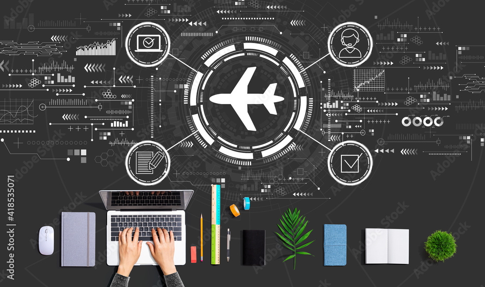 Flight ticket booking concept with person using a laptop computer