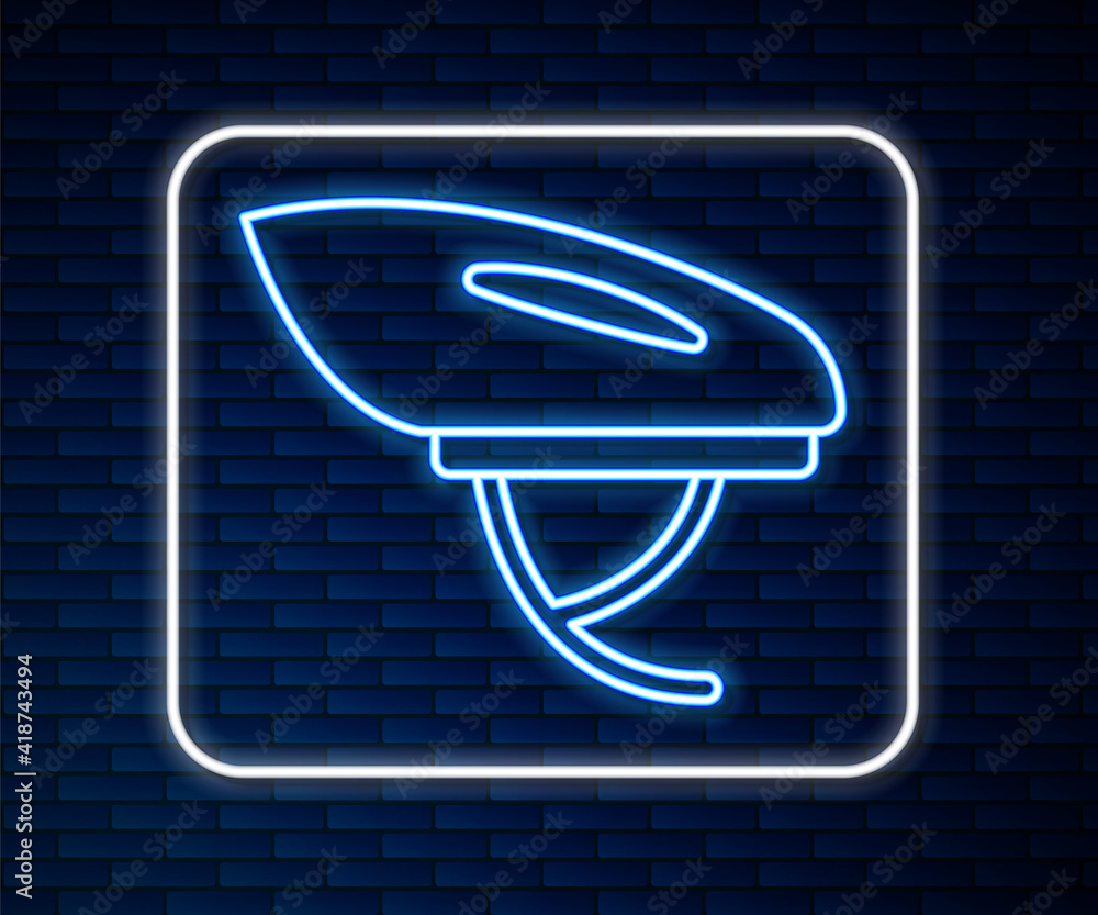 Glowing neon line Bicycle helmet icon isolated on brick wall background. Extreme sport. Sport equipm