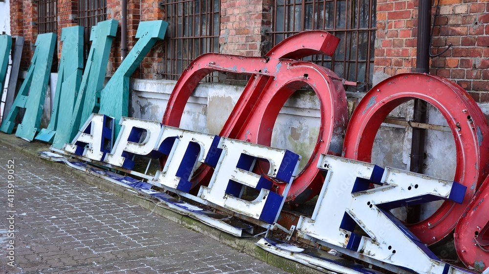 Detail of old neon inscription with the letters