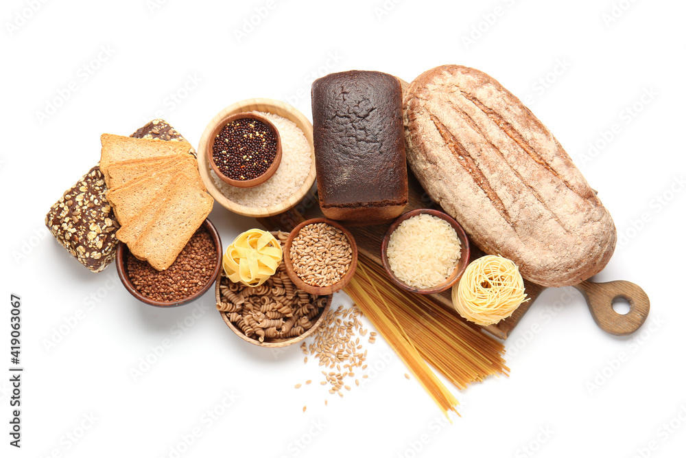 Composition with different cereals, raw pasta and bread on white background