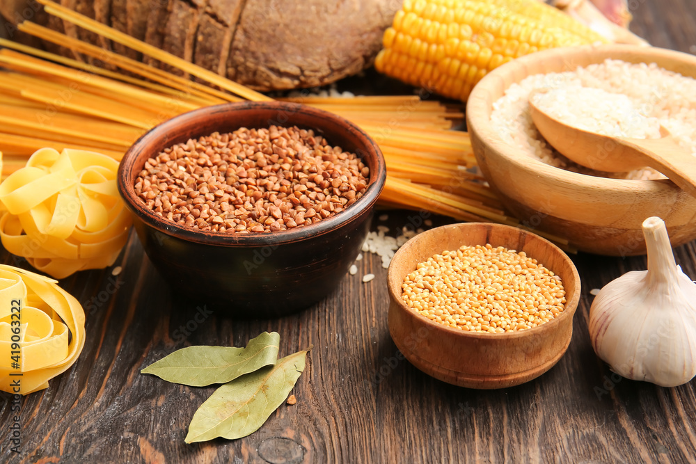 Set of different products on wooden background, closeup