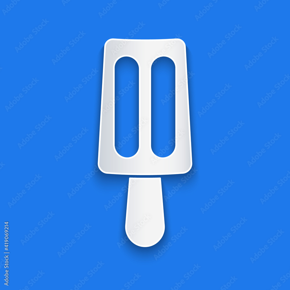 Paper cut Ice cream on stick icon isolated on blue background. Sweet symbol. Paper art style. Vector