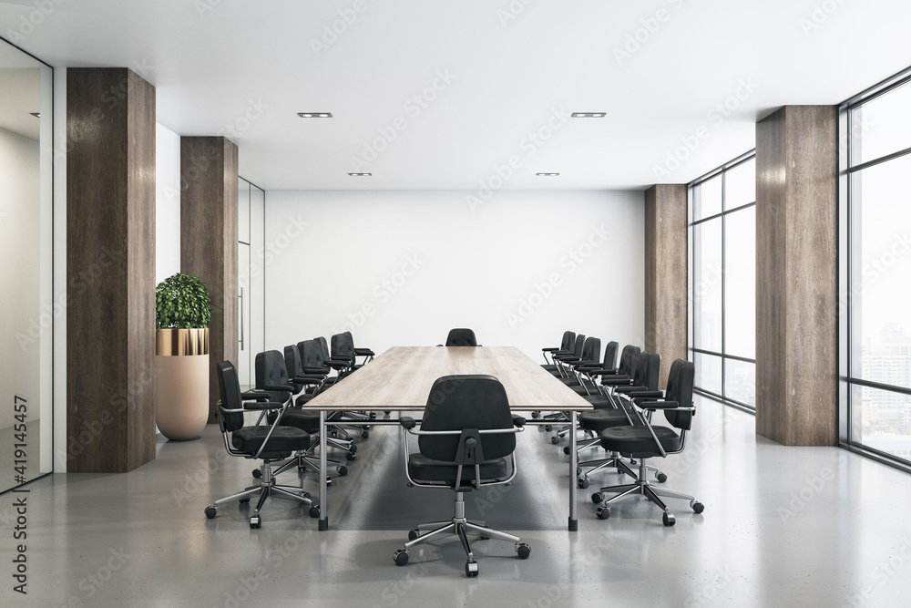 Modern spacious meeting room with wooden table and columns, black chairs on concrete floor and city 