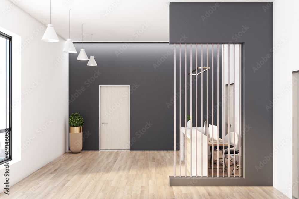 Reception desk in modern sunny office with wooden floor and furniture and black and white walls