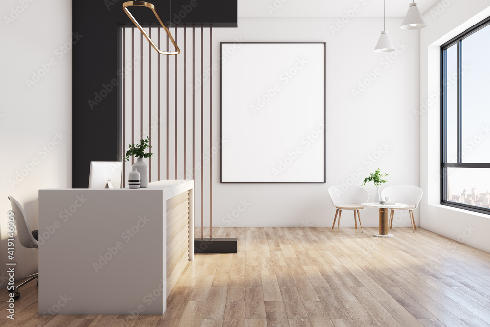 Blank white poster in black frame on light wall in sunny office with modern reception desk, wooden f