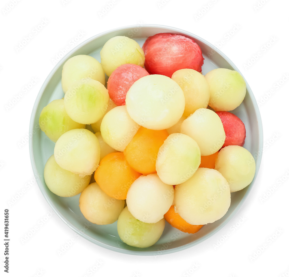 Plate with sweet fruit balls on white background