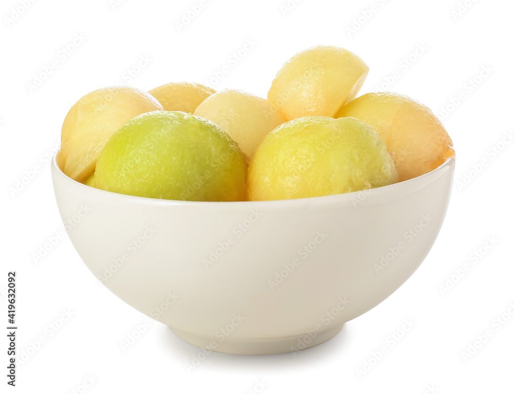 Bowl with sweet melon balls on white background