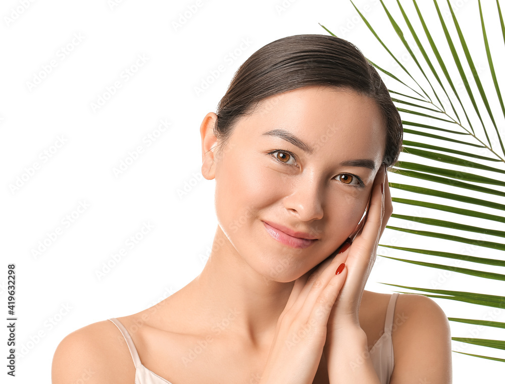 Beautiful young woman on white background