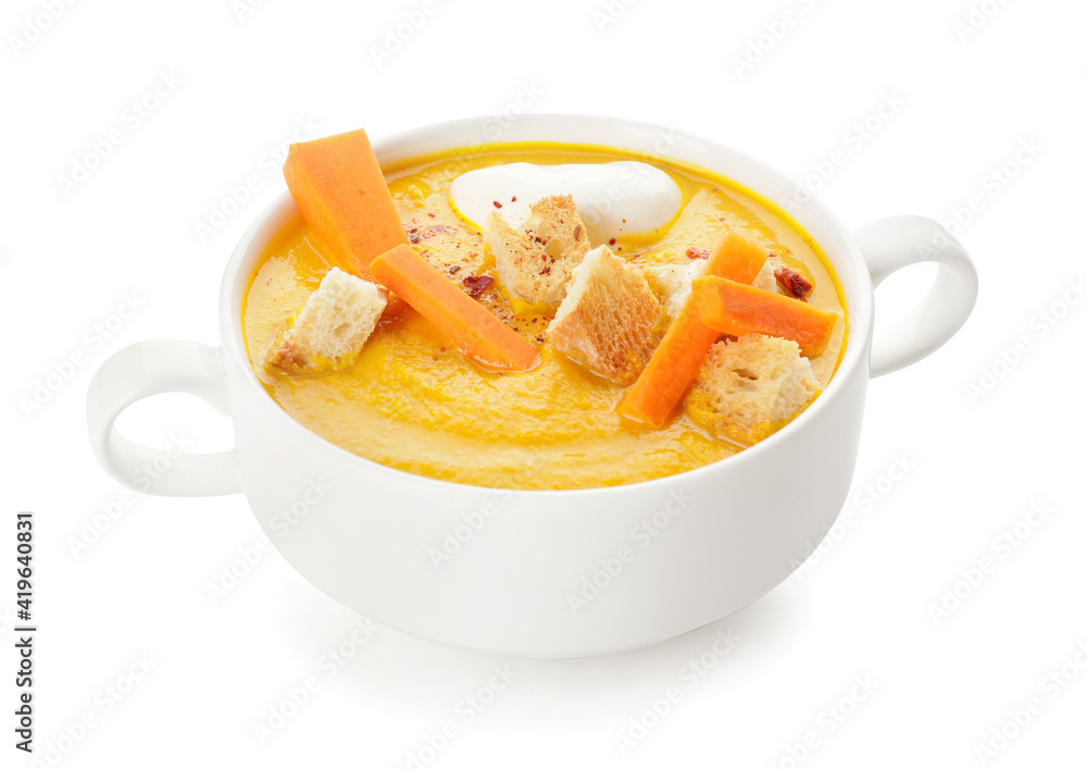 Cooking pot of tasty carrot cream soup on white background