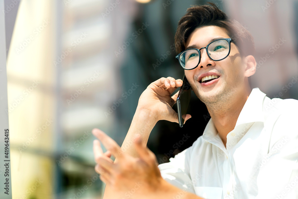 Smart attractive positive asian business male wearing glasses work remote new normal lifestyle hand 