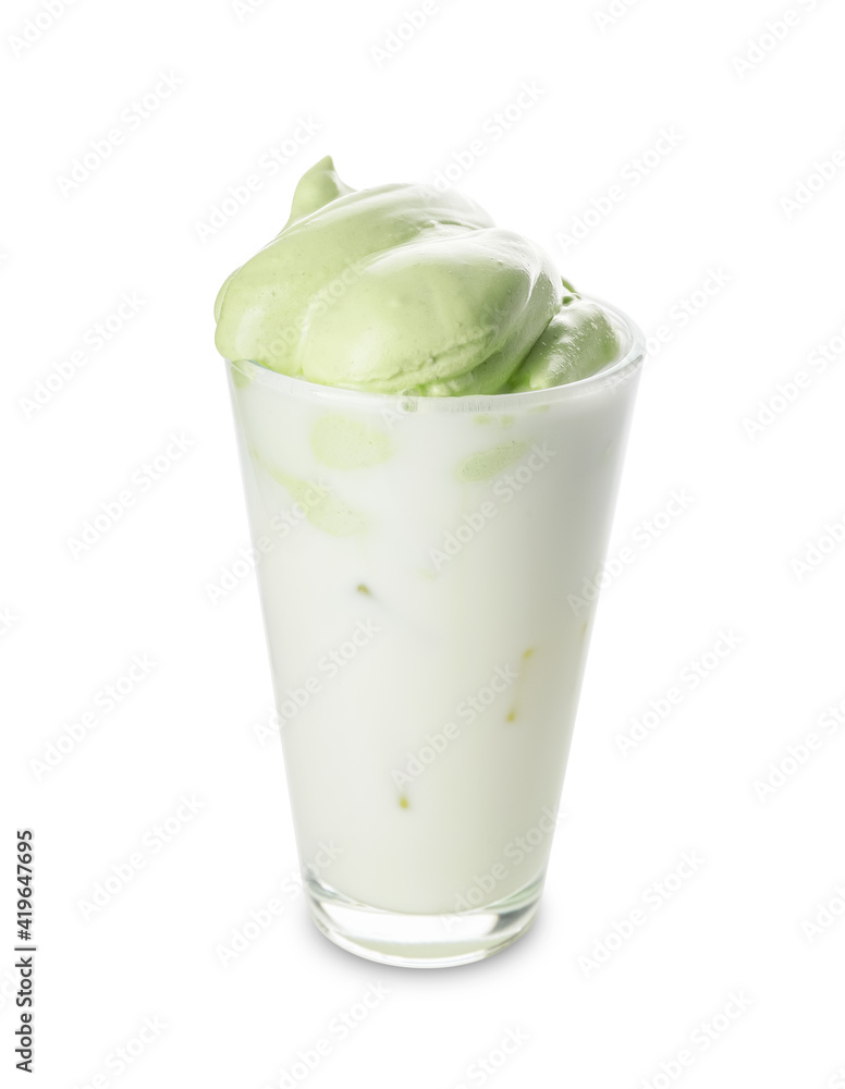 Glass of tasty dalgona matcha latte on white background