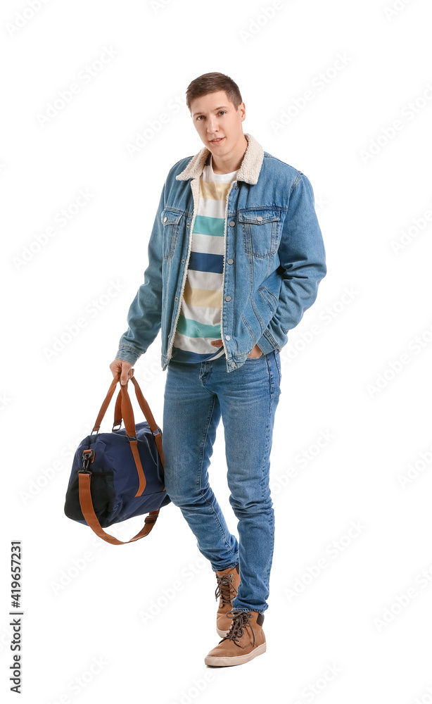 Handsome young man with bag on white background