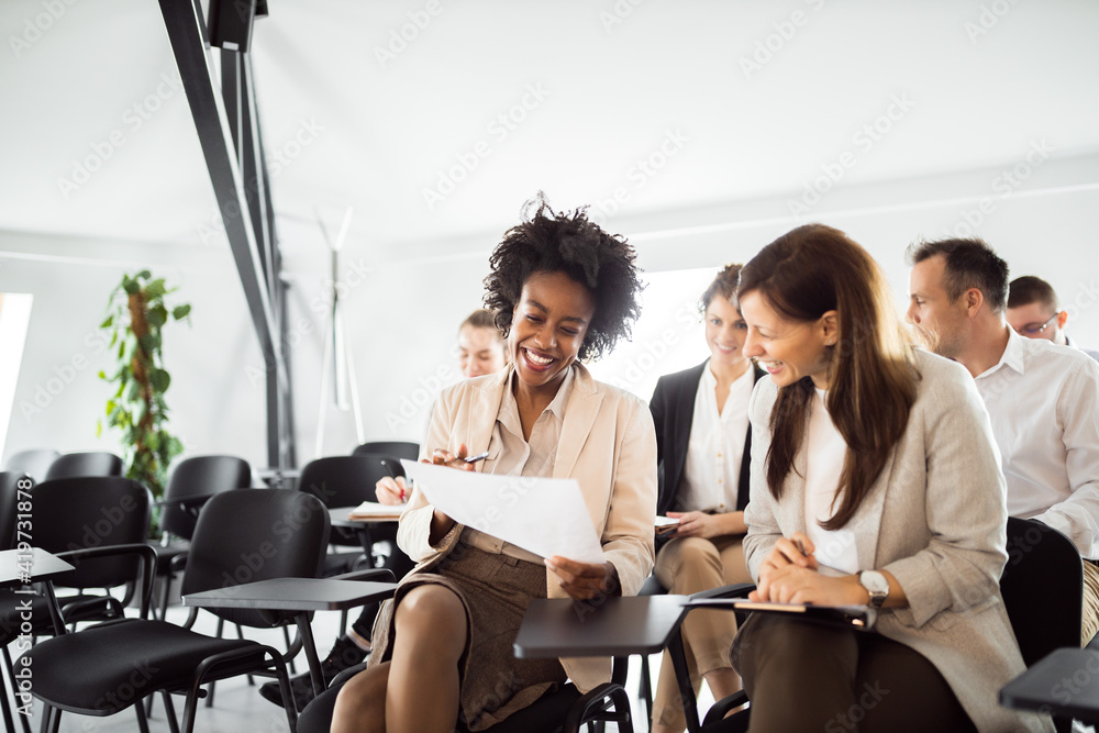 Happy people on a business seminar, portrait.