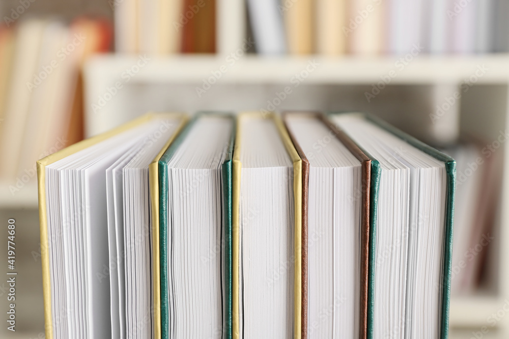 Stack of books in room, closeup