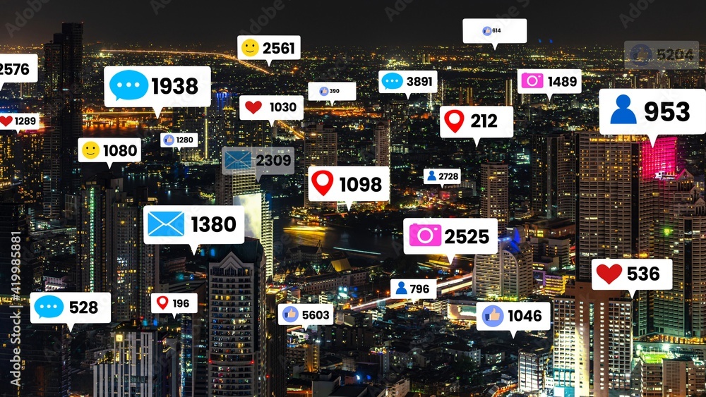 Social media icons fly over city downtown showing people engagement connection through social networ