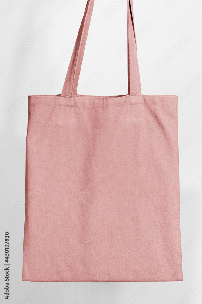 Pink tote shopping bag with blank space