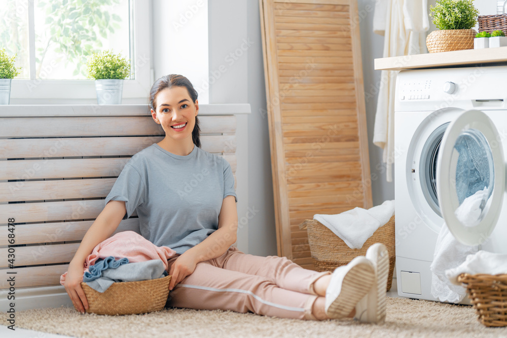 woman is doing laundry