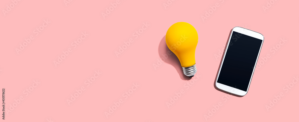 Smartphone with a yellow light bulb