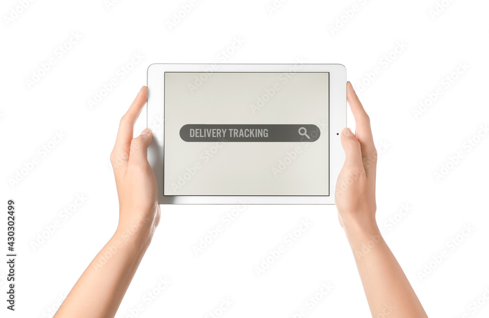 Female hands holding tablet computer with open page of delivery service application on white backgro