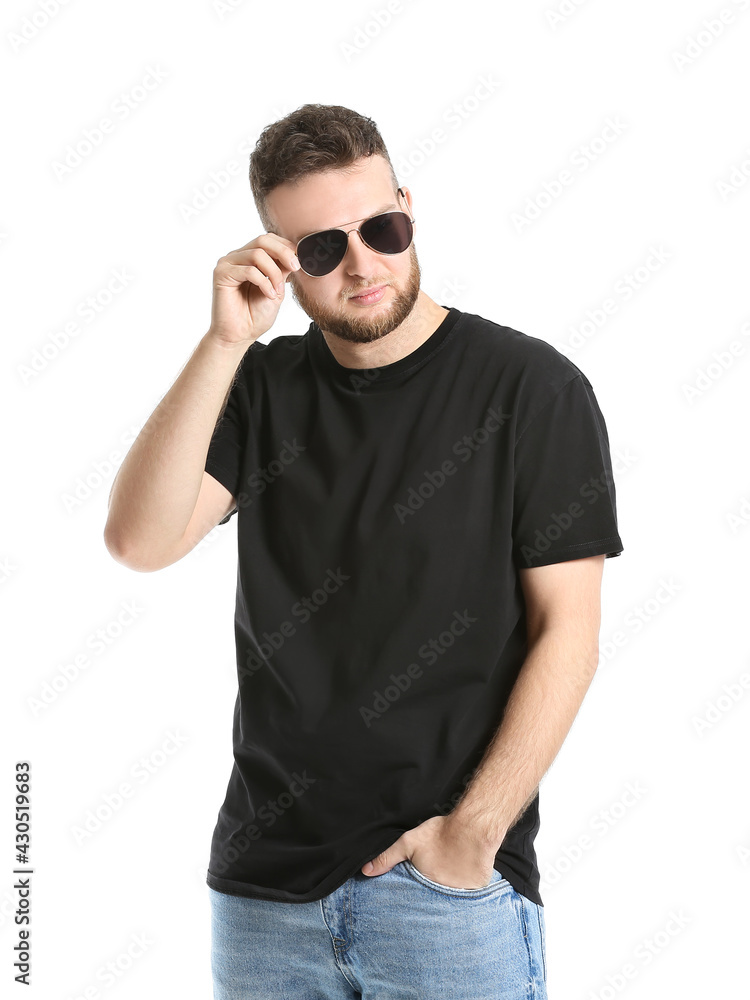 Portrait of handsome man with sunglasses on white background