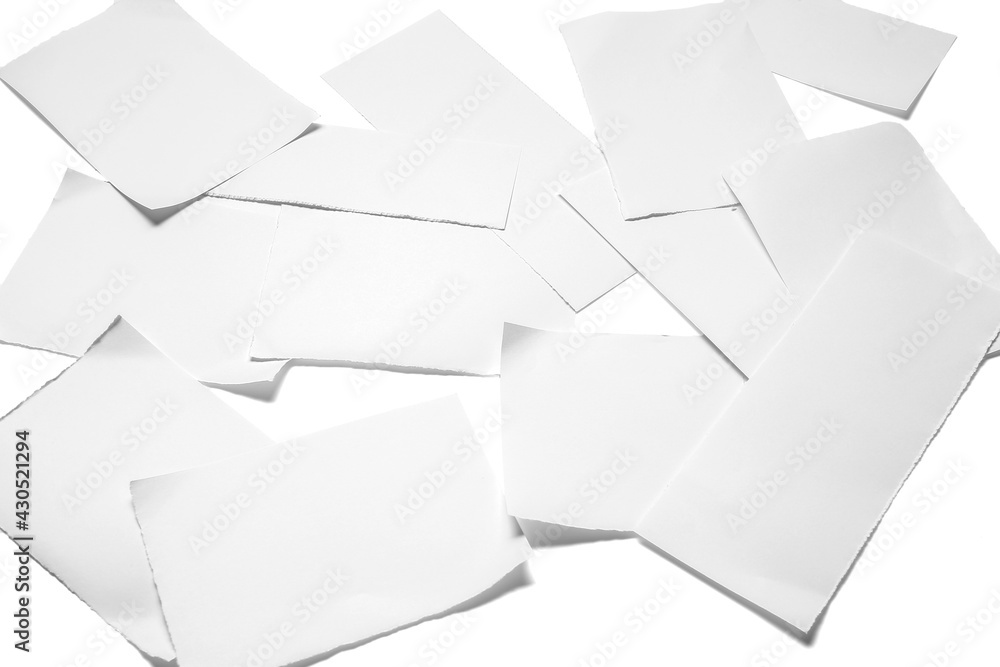 Blank sheets of paper on light background