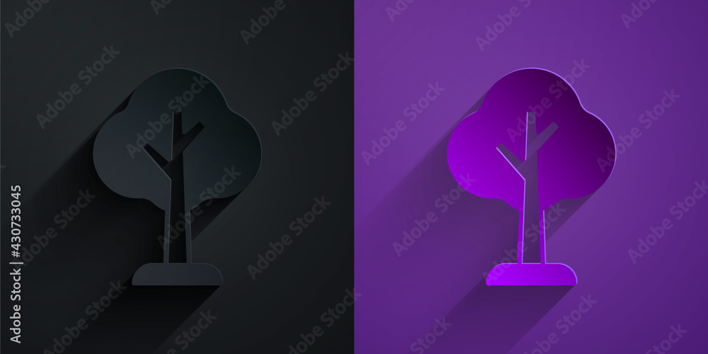 Paper cut Tree icon isolated on black on purple background. Forest symbol. Paper art style. Vector