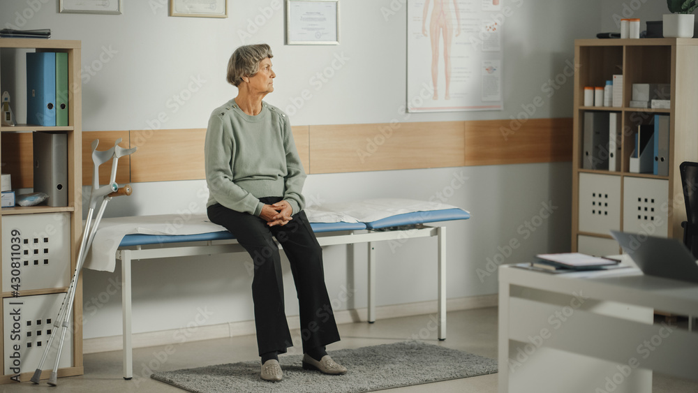 Senior Female Patient Visiting a Modern Health Care Clinic. Old Woman Waiting for Her Medical Test R