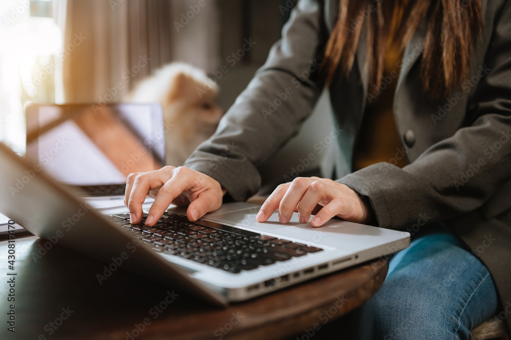 Close up of businesswoman or accountant hand holding pen working