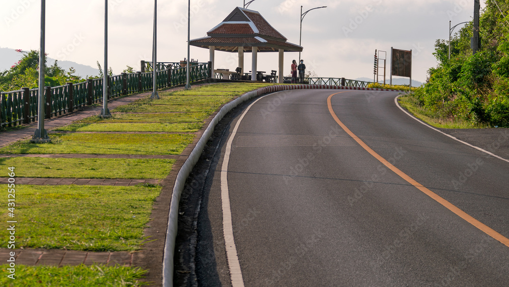 The asphalt road Kao Kad viewpoint in Summer season sunset sky background at Phuket Thailand