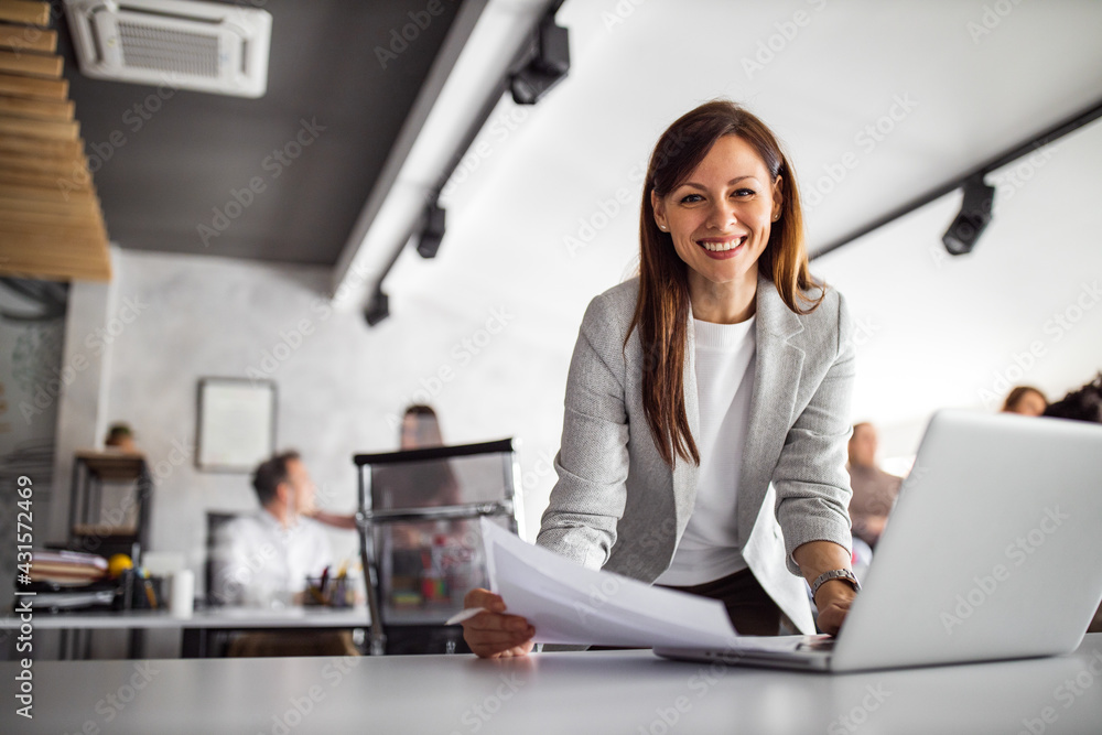 Smiling female enjoying doing her job.