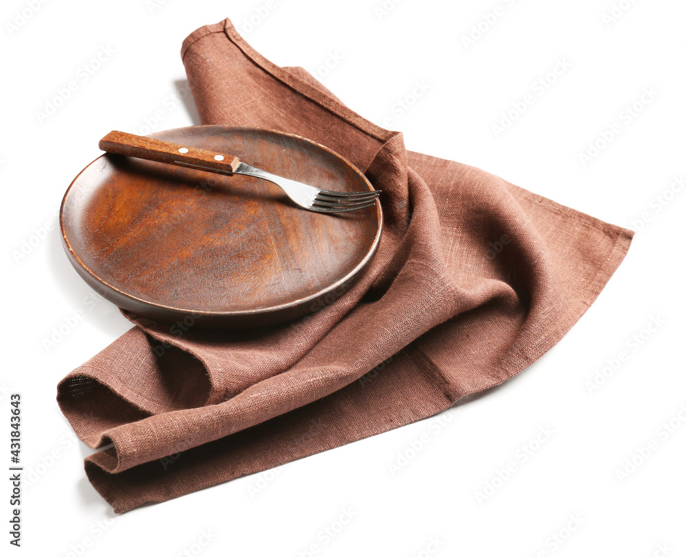 Plate with stylish napkin on white background