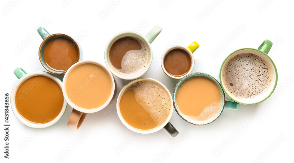 Cups of tasty coffee on white background