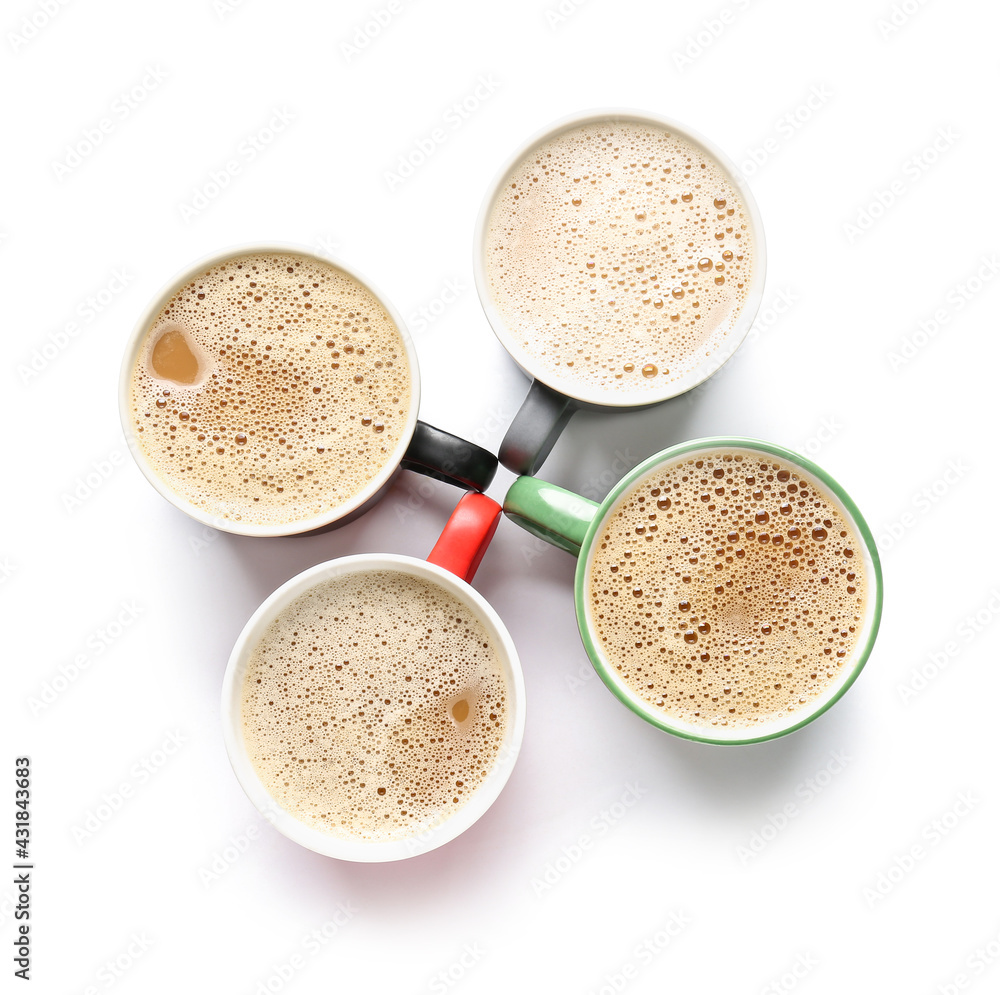 Cups of tasty coffee on white background