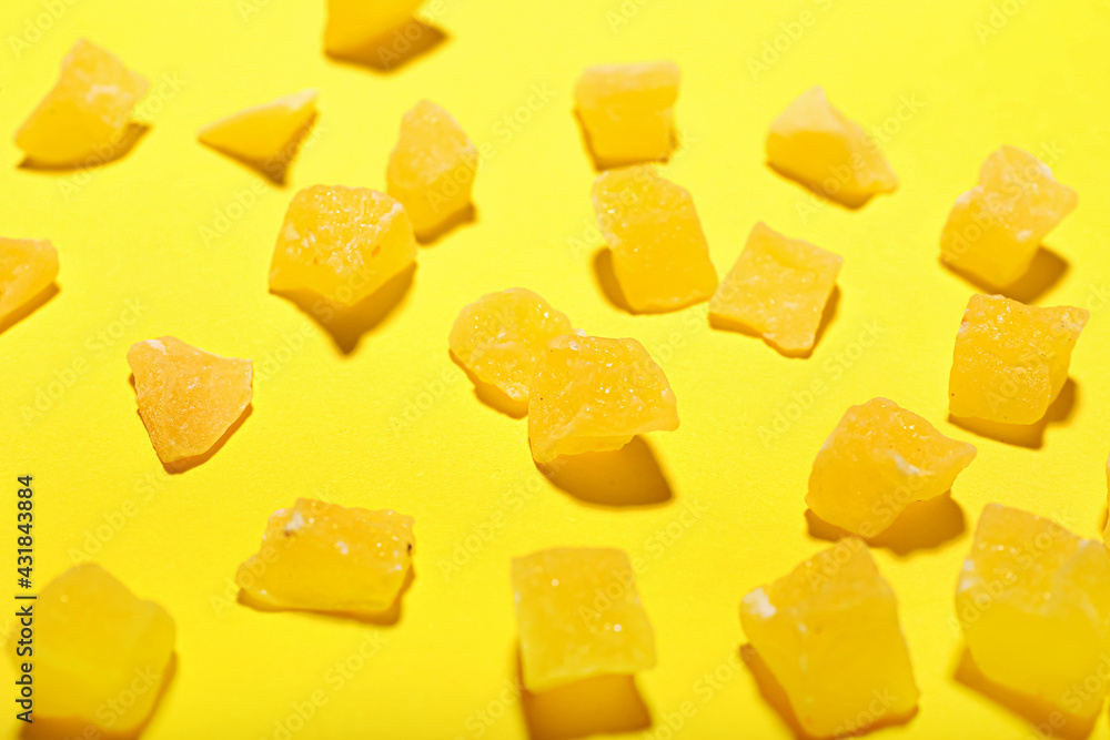 Tasty jelly candies on color background