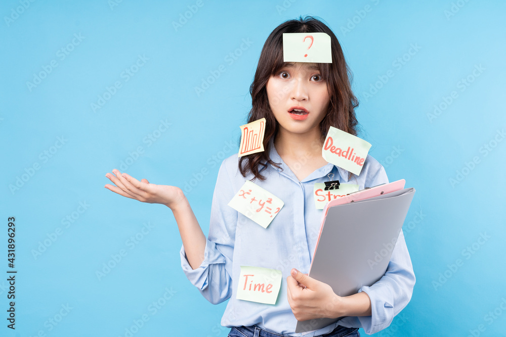 Portrait of college student girl on background