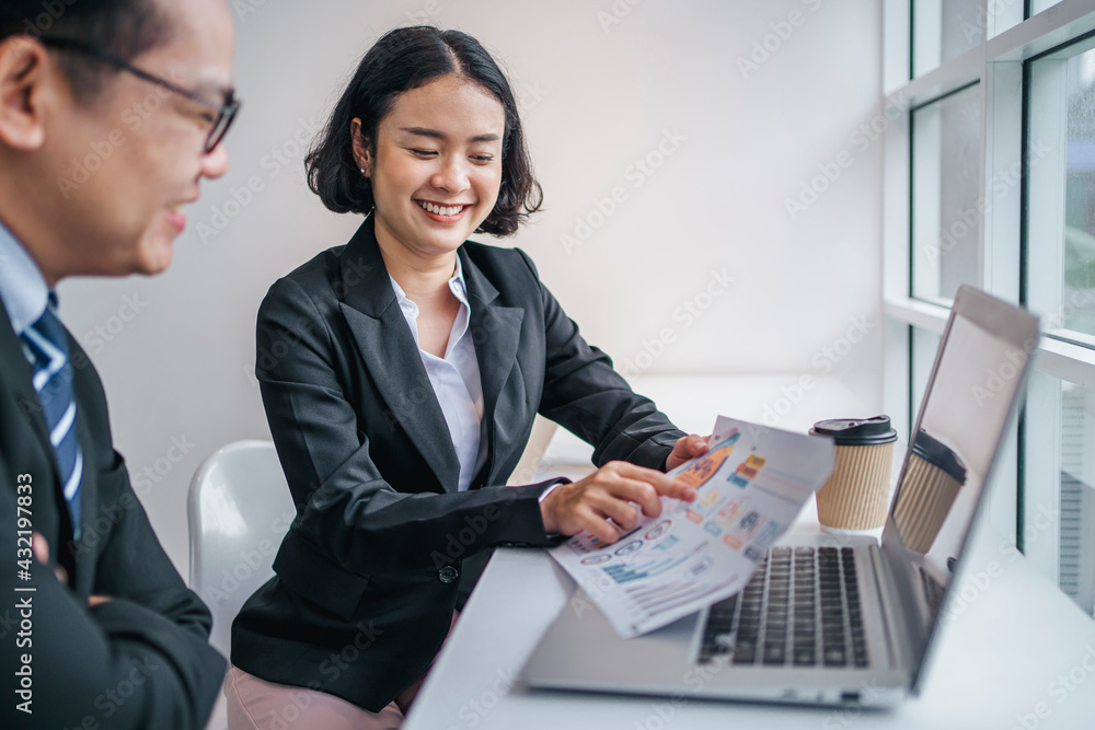 accountant  pointing on paperwork for meeting team in office room. concept finance and accounting