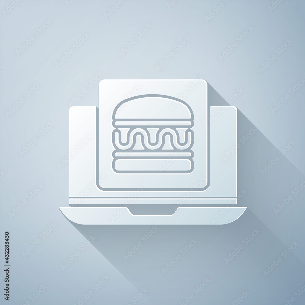 Paper cut Online ordering and burger delivery icon isolated on grey background. Paper art style. Vec