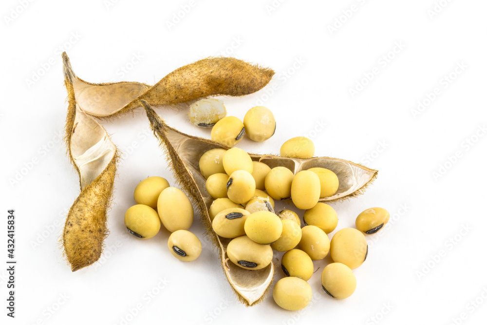 Soybeans with soya seeds stacked on a white background