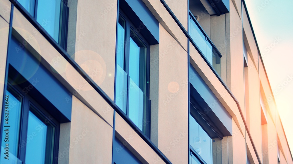 Apartment residential house and home facade architecture and outdoor facilities. Blue sky on the bac