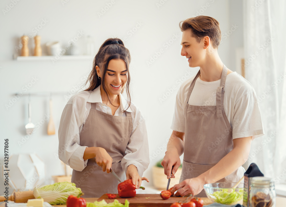 loving couple is preparing the proper meal