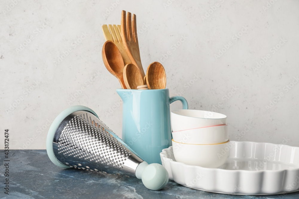 Set of kitchen utensils on light background